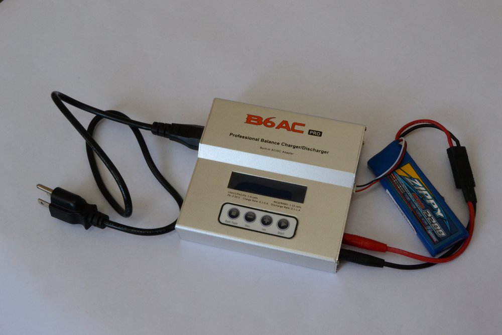 A B6AC balance charger connected to a LiPo pack by both the main lead and the balance lead