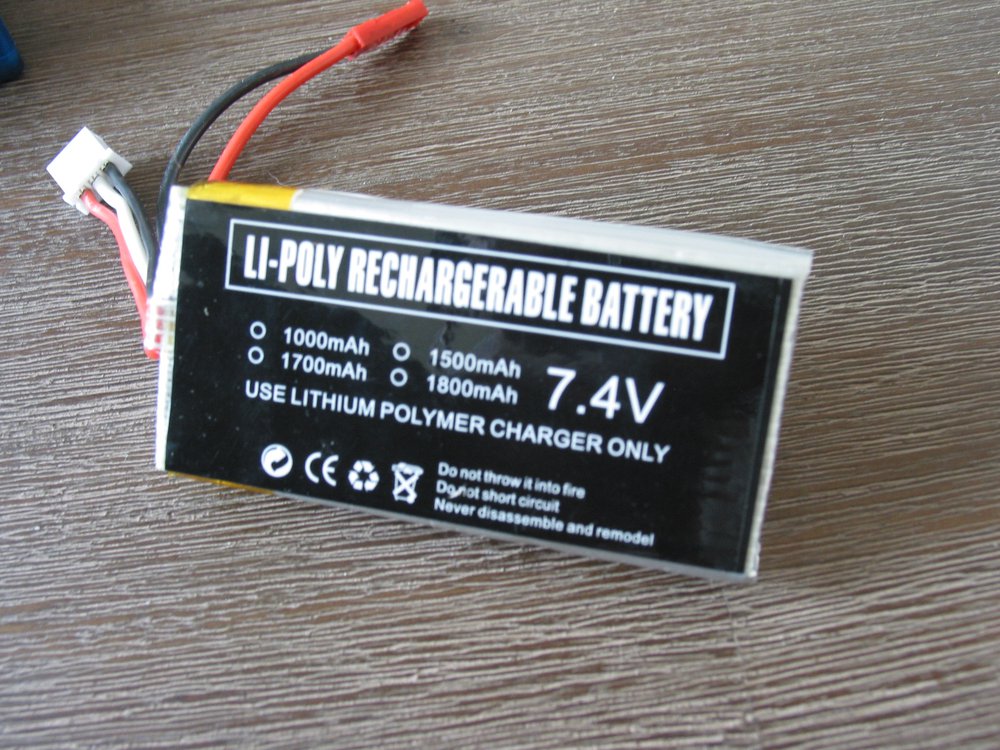 A 7.4V two-cell LiPo airsoft battery pack with its balance lead