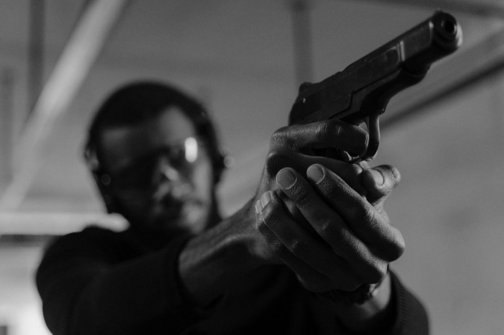 Indoor dry fire practice, pistol at aim