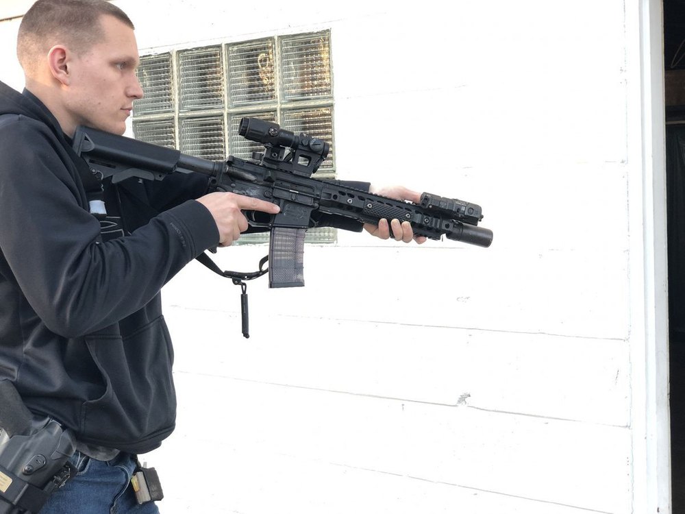 Carbine mounted in the ready position — the start position for the rifle Bill Drill