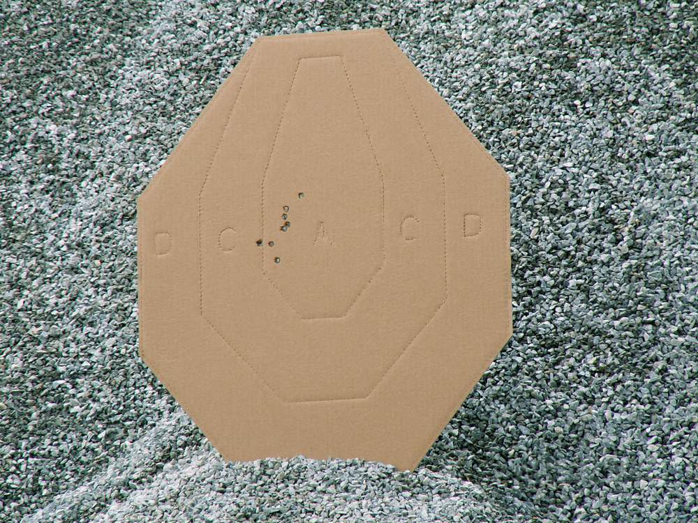 Practical shooting target with scored hits, ready to be totalled into a hit factor