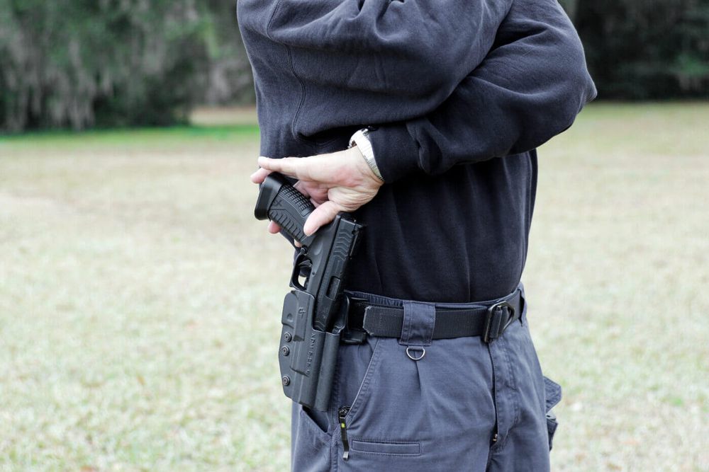 Draw stroke from a Kydex holster — where every Mozambique run starts